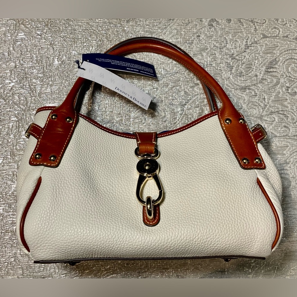 White and brown Dooney bag